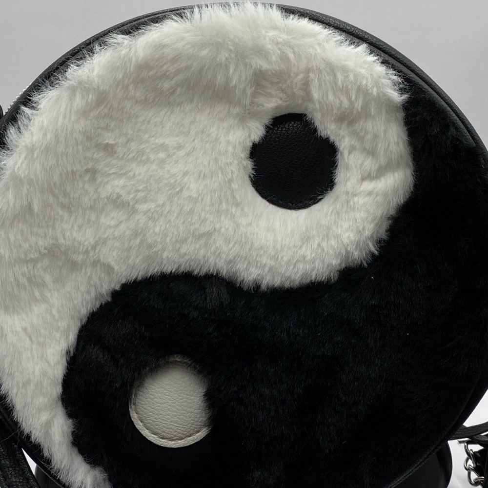 Claire’s ying yang purse. New with tags.